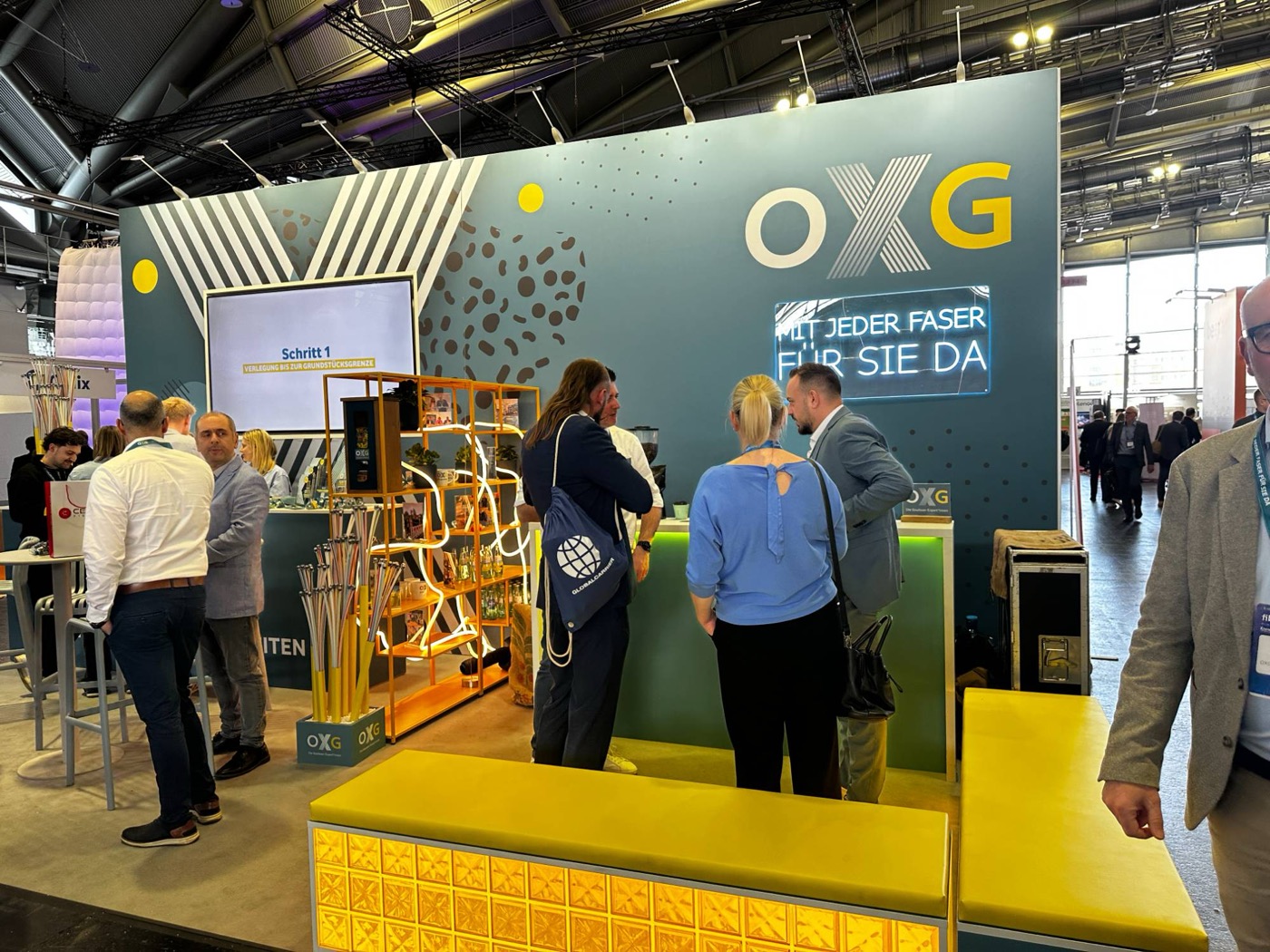 OXG Glasfaser Messestand — Mit jeder Faser für Sie da, Breitbandausbau
